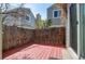 Small deck with wooden privacy fence provides outdoor living space at 11605 E Cornell Cir, Aurora, CO 80014