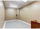 Unfinished basement space with concrete floors and walls at 11605 E Cornell Cir, Aurora, CO 80014