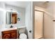 Bathroom featuring a sink, toilet, and shower at 11605 E Cornell Cir, Aurora, CO 80014