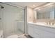 Modern bathroom with double vanity and walk-in shower at 12136 E 2Nd Dr, Aurora, CO 80011