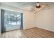 Bedroom with large window and ceiling fan at 12136 E 2Nd Dr, Aurora, CO 80011