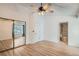 Bedroom with mirrored closet doors and en-suite bathroom at 12136 E 2Nd Dr, Aurora, CO 80011