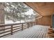 Private deck overlooking a snowy landscape at 12136 E 2Nd Dr, Aurora, CO 80011