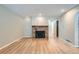 Living room with stone fireplace and light-toned walls at 12136 E 2Nd Dr, Aurora, CO 80011