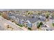 An aerial view of the complex with parking, green space, and the surrounding neighborhood at 4451 S Ammons St # 5-307, Littleton, CO 80123