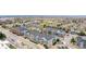 Aerial view of an apartment complex offering a beautiful neighborhood and tree-lined streets at 4451 S Ammons St # 5-307, Littleton, CO 80123
