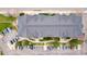 Overhead view of an apartment building showing the roofline, walkway, and parking spots at 4451 S Ammons St # 5-307, Littleton, CO 80123