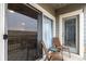 Outdoor patio featuring comfortable seating, sliding glass door, and a relaxing view at 4451 S Ammons St # 5-307, Littleton, CO 80123