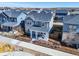 Aerial view of home, fenced yard, and the neighborhood at 9080 W 100Th Way, Broomfield, CO 80021