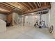 Unfinished basement with exposed beams, concrete floors, and roughed-in utilities, ready for customization at 9080 W 100Th Way, Broomfield, CO 80021