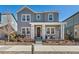 Charming two-story home boasts a welcoming front porch and stylish gray siding at 9080 W 100Th Way, Broomfield, CO 80021