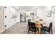 Basement featuring a dining area with a table and an adjacent kitchen at 19473 W 58Th Pl, Golden, CO 80403