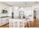 Modern kitchen featuring a large island, stainless steel appliances, and ample cabinet space at 19473 W 58Th Pl, Golden, CO 80403