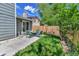 Charming backyard featuring a patio, comfortable seating, and lush green grass, perfect for relaxation and outdoor enjoyment at 11788 E Atlantic Pl, Aurora, CO 80014