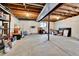 Unfinished basement with concrete floor, exposed ceiling, and small window provides potential for customization at 11788 E Atlantic Pl, Aurora, CO 80014