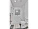 Modern bathroom featuring a glass shower with decorative tile and sleek fixtures at 11788 E Atlantic Pl, Aurora, CO 80014