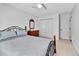 Bright bedroom with comfortable bed, a window, and a closet at 11788 E Atlantic Pl, Aurora, CO 80014