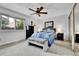 Bedroom with ceiling fan, neutral carpet, and view from the window at 11788 E Atlantic Pl, Aurora, CO 80014