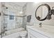 Elegant bathroom features a glass-enclosed shower with marble tiling and modern fixtures at 12450 Watkins Rd, Hudson, CO 80642