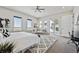 Bright and spacious main bedroom featuring an outdoor patio and neutral colors at 12450 Watkins Rd, Hudson, CO 80642