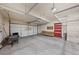 Spacious garage with ample room for storage, tools, and parking at 9569 Elk Mountain Cir, Littleton, CO 80125