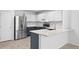 Well-appointed kitchen with stainless steel appliances, granite counters, and ample cabinet space at 9569 Elk Mountain Cir, Littleton, CO 80125