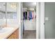 Convenient walk-in closet is located in the bathroom and has ample storage space for your wardrobe at 17808 E 104Th Pl # C, Commerce City, CO 80022