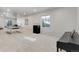 Finished basement with windows, recessed lighting, carpet, piano, and table creating a multifunctional space at 14290 Hop Clover St, Parker, CO 80134