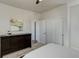 This bedroom features a sliding door closet, a dresser, and a ceiling fan at 14290 Hop Clover St, Parker, CO 80134
