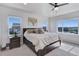 This primary bedroom suite features 3 large windows for neighborhood views and a ceiling fan at 14290 Hop Clover St, Parker, CO 80134