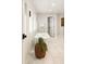 Bright bathroom with a claw foot tub, shiplap walls and views of the backyard at 3147 Juniper Ct, Golden, CO 80401