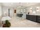 Modern bathroom with soaking tub, glass-enclosed shower with bench, and dual sink vanity at 3147 Juniper Ct, Golden, CO 80401