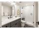 Modern bathroom with a glass-enclosed shower and sleek vanity at 3147 Juniper Ct, Golden, CO 80401
