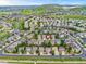 Breathtaking aerial perspective of a neighborhood with mountain views and neatly arranged residences at 2833 Open Sky Way, Castle Rock, CO 80109