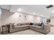Finished basement with a sectional sofa, decor, and play area at 2833 Open Sky Way, Castle Rock, CO 80109