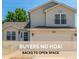 Charming two-story home with a well-manicured lawn and inviting curb appeal at 606 Beth Ave, Fort Lupton, CO 80621