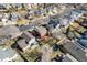 Aerial view of a neighborhood featuring well-maintained homes with landscaped yards and mature trees at 5300 E 129Th Way, Thornton, CO 80241