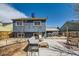 A spacious backyard including a seating area and a patio area with a grill at 19624 E Girard Dr, Aurora, CO 80013