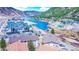 Scenic aerial view of a lakeside community surrounded by mountains on a clear, sunny day at 1890 Argentine St # C301, Georgetown, CO 80444