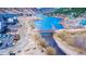 Aerial view of the neighborhood with a river and a bridge crossing the water, surrounded by homes and green spaces at 1890 Argentine St # C301, Georgetown, CO 80444