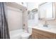 Clean and bright bathroom featuring a shower-tub combo and modern vanity at 1890 Argentine St # C301, Georgetown, CO 80444