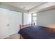 Relaxing bedroom features ample closet space and soft natural light at 1890 Argentine St # C301, Georgetown, CO 80444