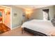 Cozy bedroom featuring plush carpeting, neutral paint, and a queen-sized bed with a comfortable mattress at 1890 Argentine St # C301, Georgetown, CO 80444