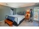 Inviting bedroom featuring a cozy bed with mountain views from the window at 1890 Argentine St # C301, Georgetown, CO 80444