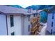 Condominium building with multiple balconies and mountain views at 1890 Argentine St # C301, Georgetown, CO 80444