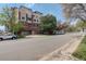 A street view of the apartment building and trees at 2200 S University Blvd # 313, Denver, CO 80210