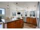Bright kitchen featuring stainless appliances, granite countertops and ample natural light at 2200 S University Blvd # 313, Denver, CO 80210
