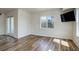 Bright living room with access to balcony, ample windows and hard surface floors at 2200 S University Blvd # 313, Denver, CO 80210