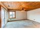 Bedroom with wood plank ceiling, carpet, and natural light at 6066 S Monaco Way, Centennial, CO 80111