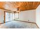 Bedroom with carpet, wood plank ceiling, and natural light at 6066 S Monaco Way, Centennial, CO 80111